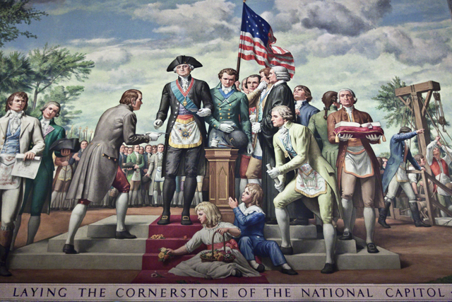 George Washington laying the cornerstone of the national capitol.